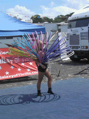 Miss Ashley Winn fans her brightly colored hula hoops