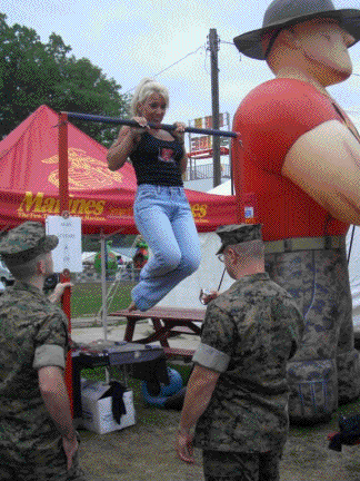 Galaxy Girl shows her strength in a pull-up challenge hosted by the Marines