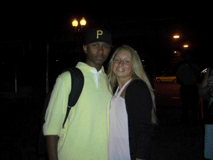 Ashley poses with Usher's brother and band member, James Raymond