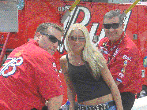 Ashley poses with Dale Earnhardt Jr.'s crew members at the Coca Cola 600 NASCAR race